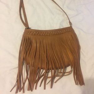 Medium cross body tan fringe purse